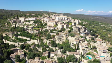 Aerial-view-of-Gordes-Luberon-valley-most-beautiful-village-of-France-sunny-day
